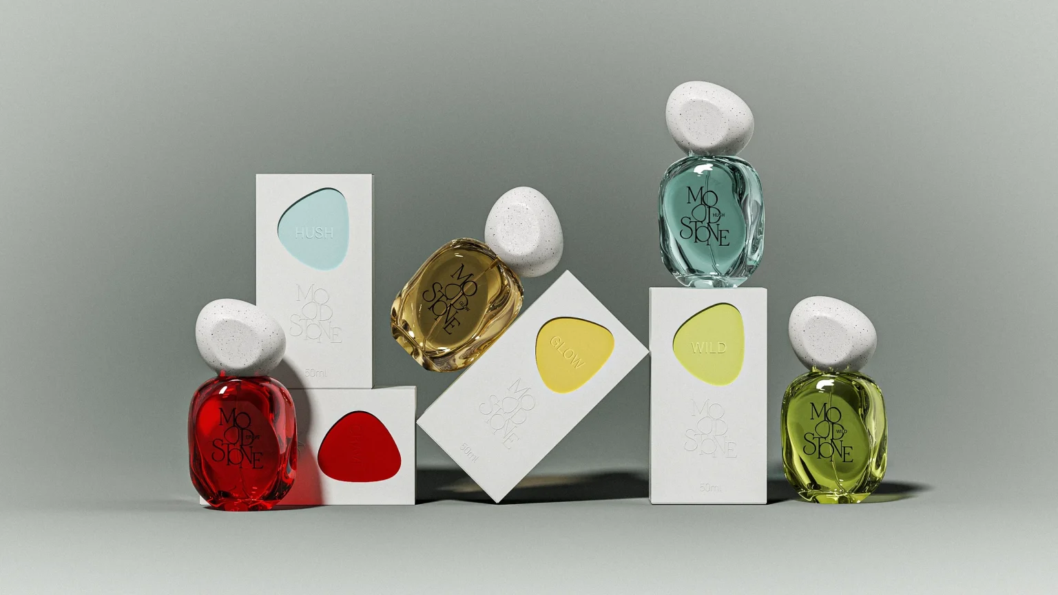 MOOD//STONE render of red, amber, aqua and lime pebble glass perfume bottles with speckled stone caps posed on white window cartons.