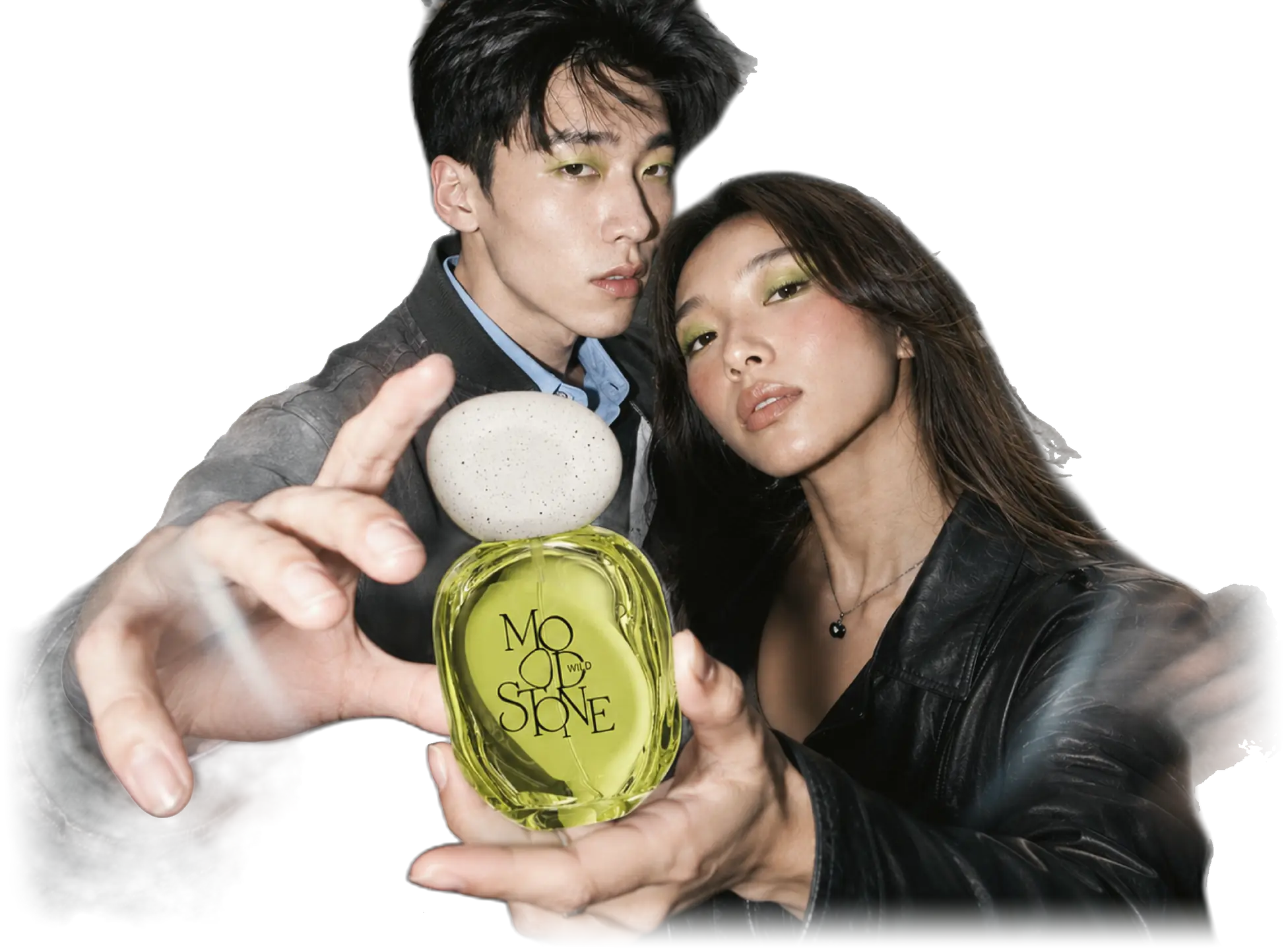The two WILD friends in black leather jackets, one holding the green MOOD//STONE bottle out toward the camera